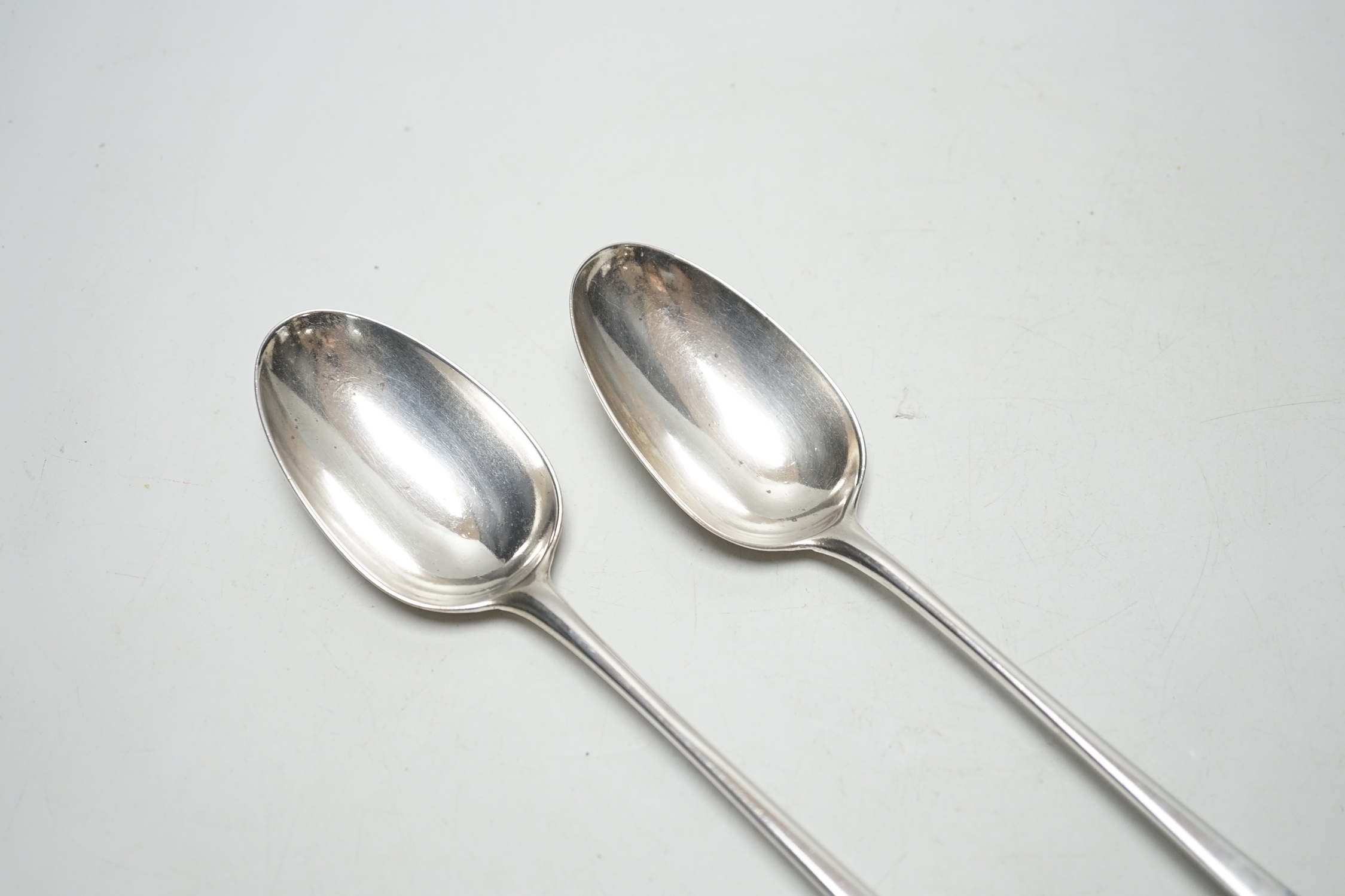 A pair of George III Old English pattern base marked basting spoons, London 1771?, 30cm, 7oz.